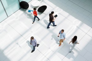 People walking on office concourse